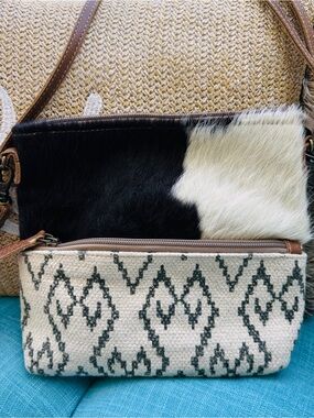 Myra bag Neutral Black & White Haircalf Crossbody Bag with Patterned Pouch